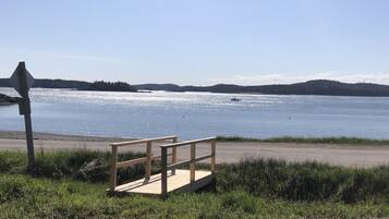 PĂ„ stranden och solstolar