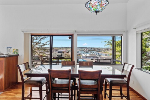 Overlook the Winchester Bay Harbor from the spacious 3rd Level!