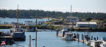 Overlook the Winchester Bay Harbor from the spacious 3rd Level!