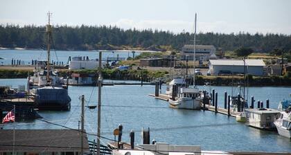 Overlook the Winchester Bay Harbor from the spacious 3rd Level!