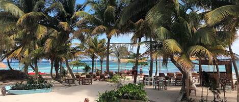 On the beach, sun-loungers, beach towels