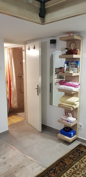 Shower, free toiletries, hair dryer, bathrobes