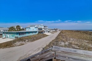 Enjoy stunning ocean views from the balcony of this beachfront property.