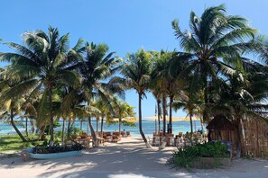 On the beach, sun-loungers, beach towels