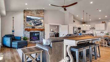 TV, fireplace, books, offices