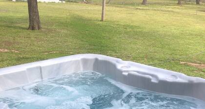 20 Minutes to Southern Hills. Outdoor living space/pickleball court.