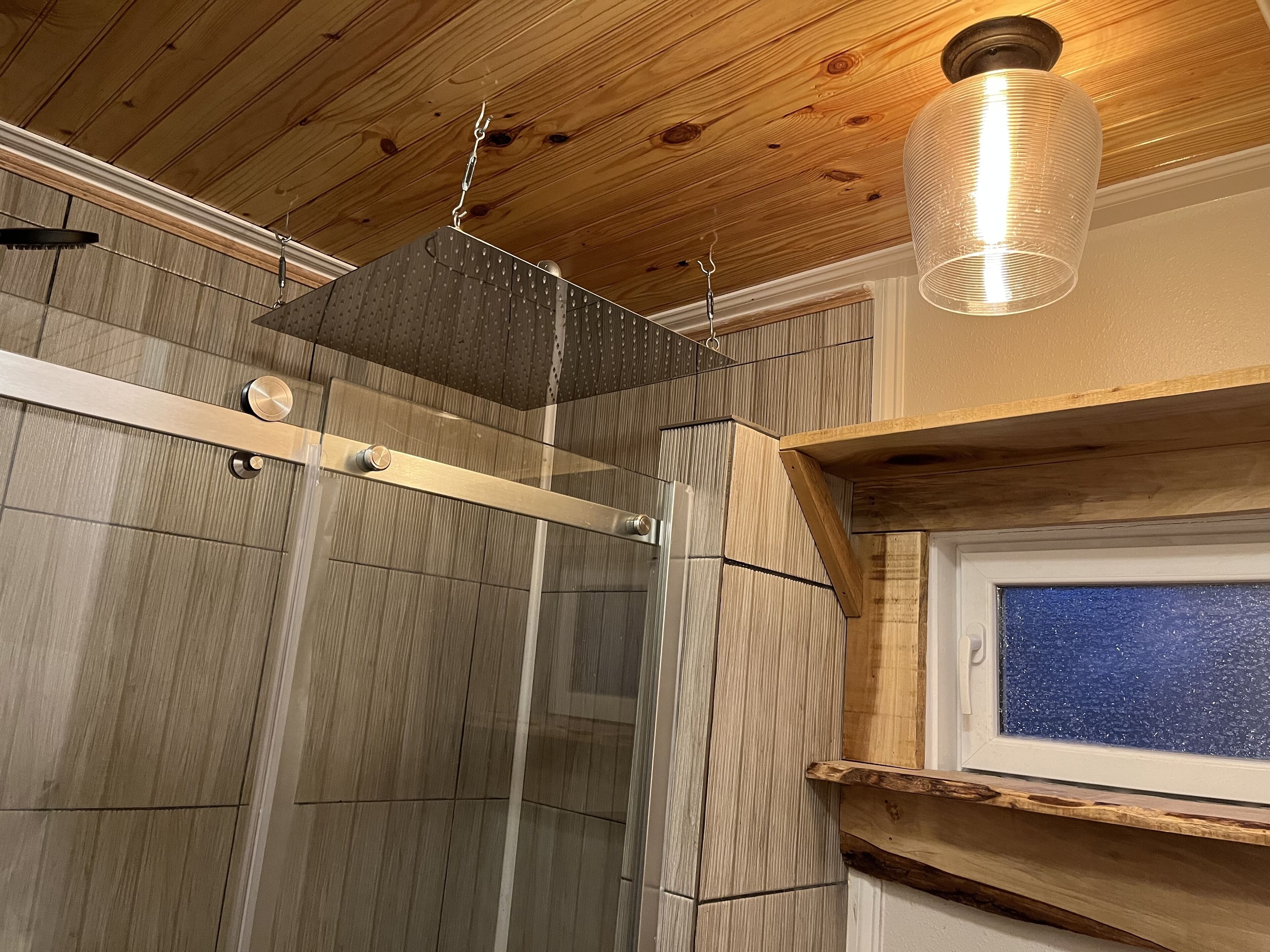 Combined shower/tub, hair dryer, towels, soap