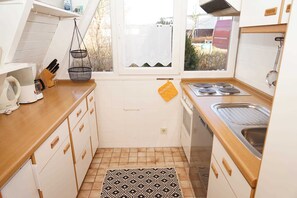 Imagen sin descripción, 5 de 15, botón