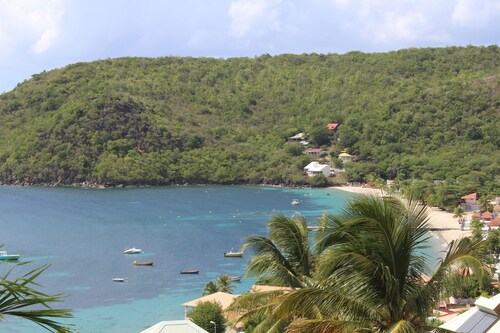 Studio with sea view, 5-minute walk from the beach and jacuzzi 