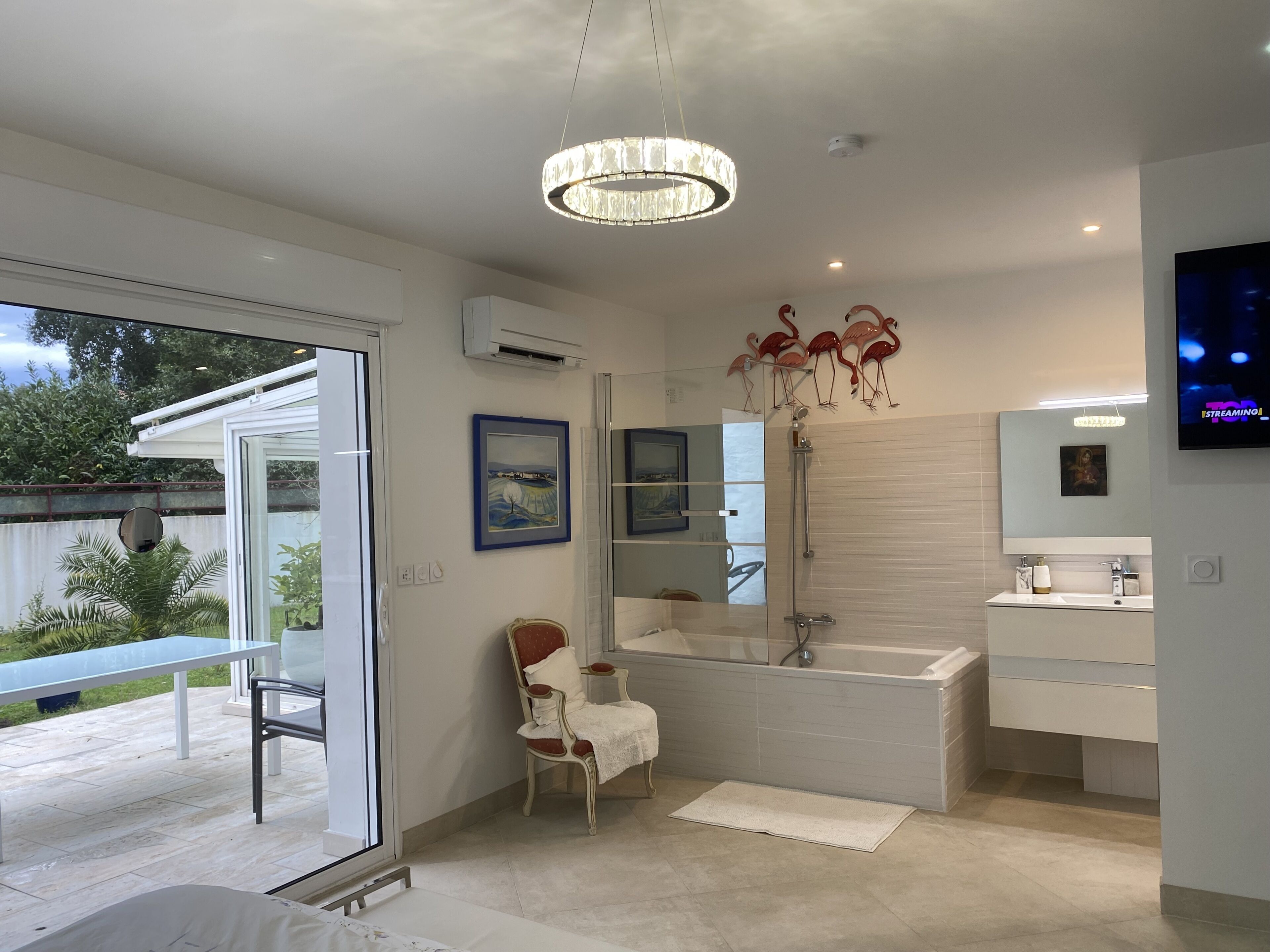 Bathtub, hair dryer, towels, soap