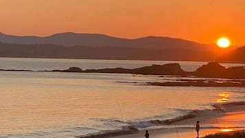 Una spiaggia nelle vicinanze, teli da spiaggia