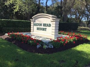 Experience the charm of Hilton Head Resort, surrounded by beautifully maintained gardens and lush greenery.