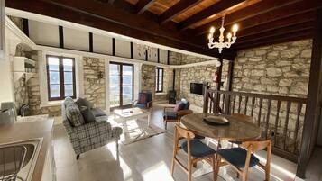 Design House | Living area | 42-inch LCD TV with digital channels, TV, fireplace