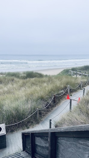 On the beach, sun loungers, beach towels