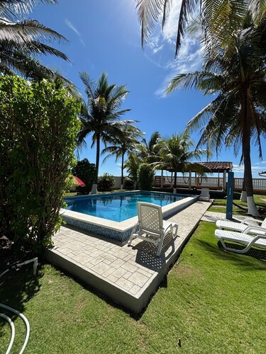 Papi’s Fish Camp, private beach front house near International airport