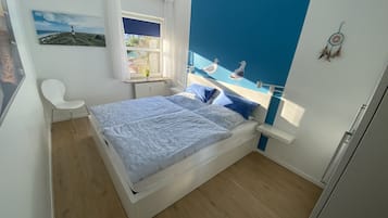 1 slaapkamer, een strijkplank/strijkijzer, reisbedje, gratis wifi