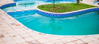 Self-contained bed sitter overlooking a beautiful scenery in an animal farm.