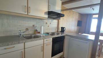 Standard Apartment | Private kitchen | Highchair