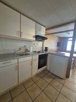 Standard Apartment | Private kitchen | Highchair