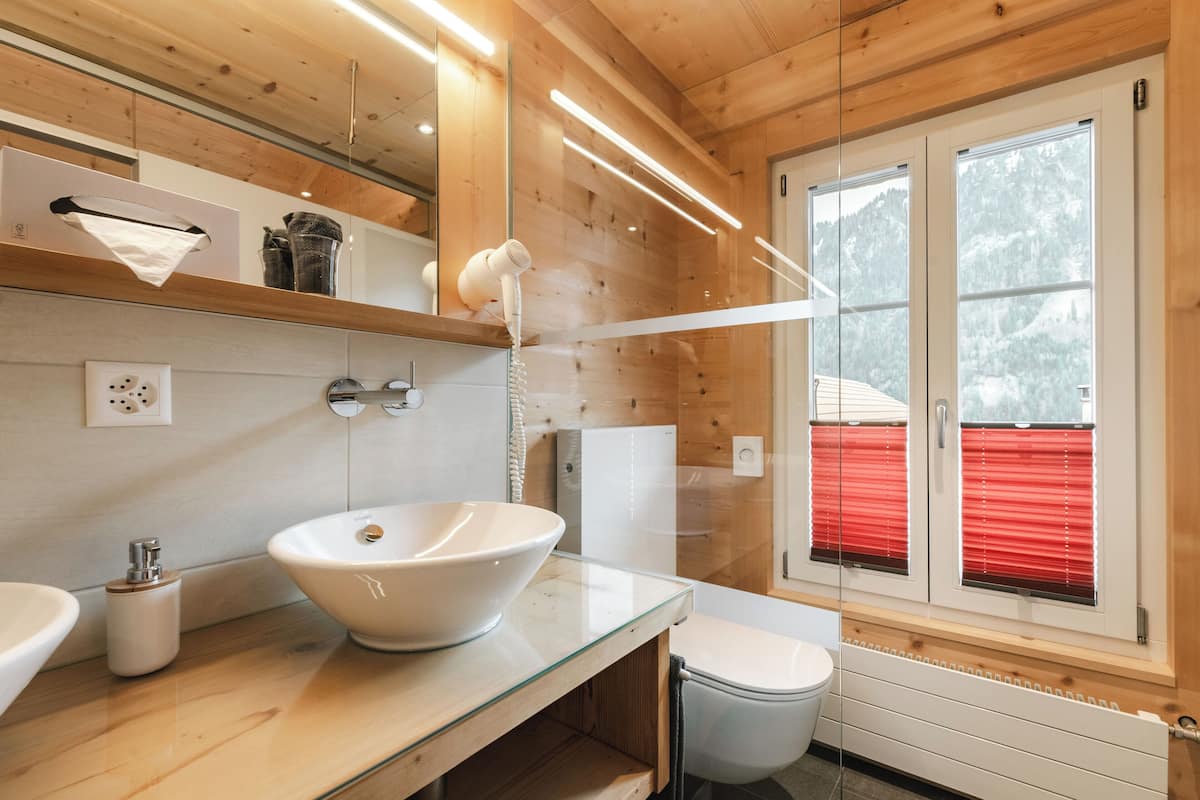 superior double room | bathroom | shower, free toiletries, hair dryer, towels