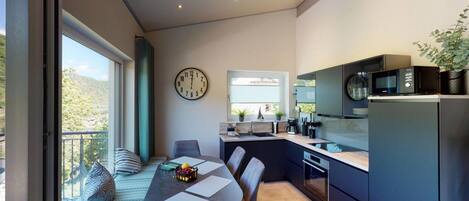 Fridge, stovetop, dishwasher, coffee/tea maker