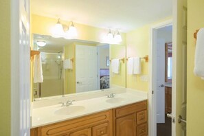 Combined shower/tub, hair dryer, towels, soap