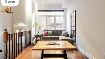 Smart TV, fireplace, books, printers