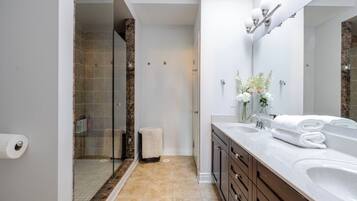 Bathtub, hair dryer, towels, soap