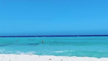 On the beach, sun loungers