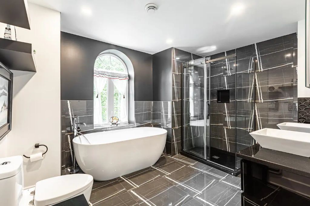 Bathtub, jetted tub, hair dryer, towels