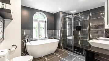 Bathtub, jetted tub, hair dryer, towels