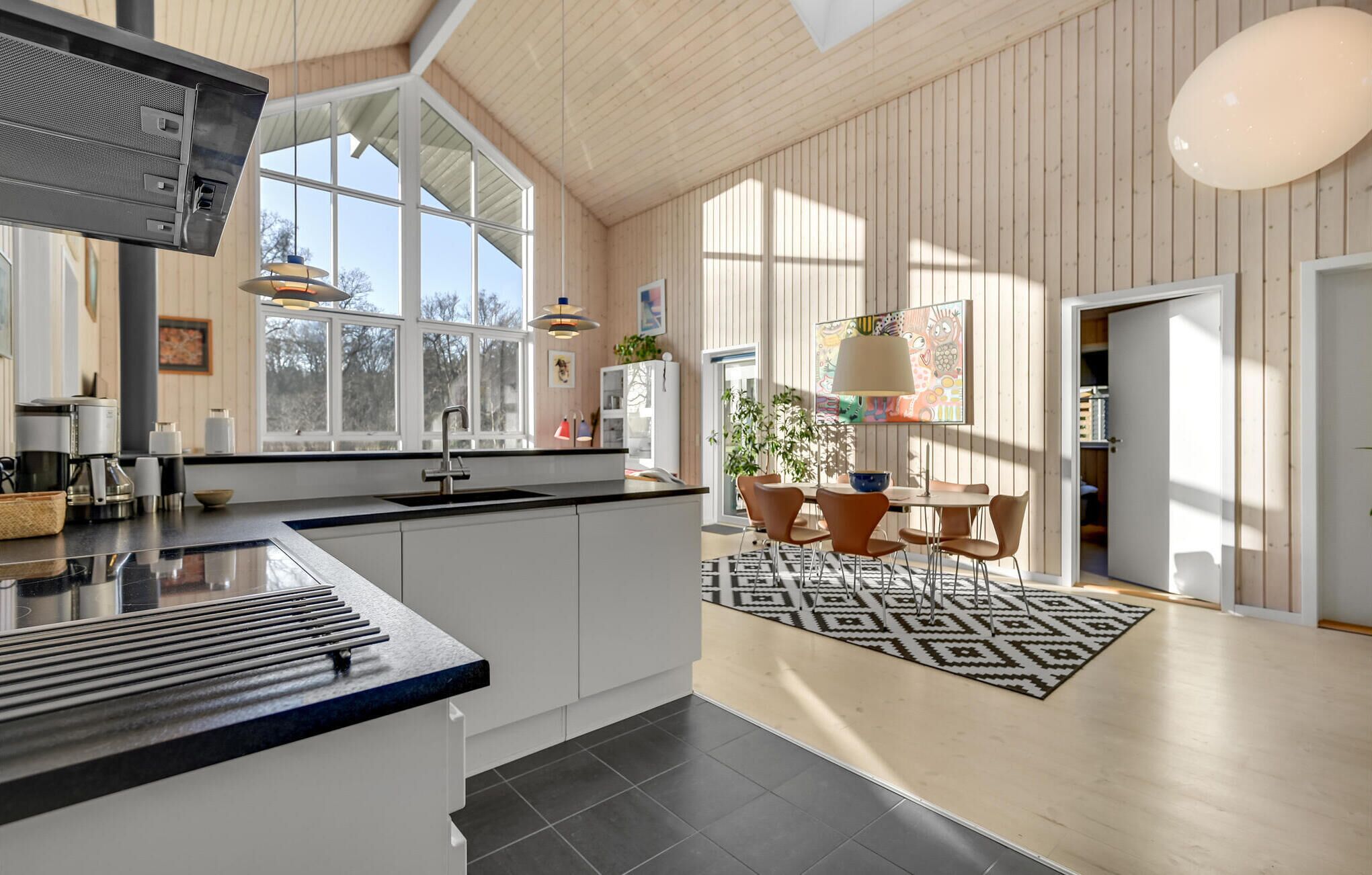 Fridge, stovetop, dishwasher, coffee/tea maker