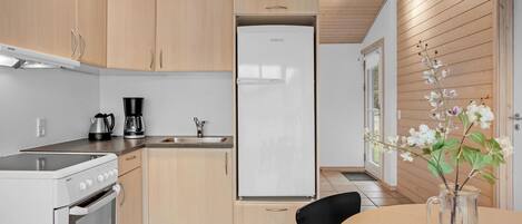 Fridge, stovetop, coffee/tea maker