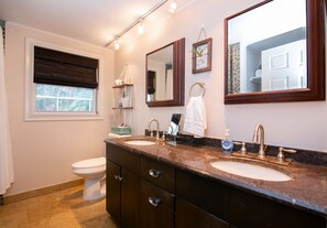 Combined shower/tub, hair dryer, towels, soap