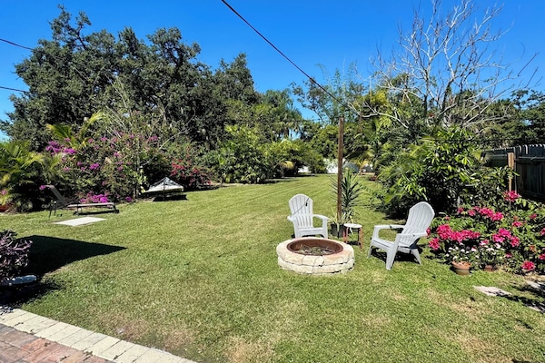 Backyard on a clear sunny day, full fenced with privacy