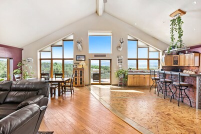 Quiet country getaway with STUNNING VIEWS, 4 bedrooms, 3 1/2 bath, large garage.