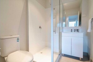 Shower, towels, soap, shampoo