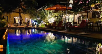Maldives Family Vacation Home on the beach with a pool and game room