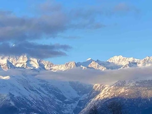 A mountainous landscape with snow-covered peaks and a clear sky. - Appartement for Holiday Lodge 1891 (Stalden)