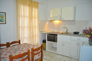 Apartment, 2 Bedrooms, Smoking, Balcony | Dining - Holiday Apartments Maria With Pool and Panorama View - Agios Gordios Beach 1 (Corfu)