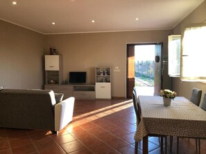 Villa, 2 Bedrooms, Smoking, Patio | Living room | Flat-screen TV