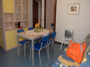 Villa, 2 Bedrooms, Patio, Garden View | Dining room - Family Villa in Lignano Pineta (Lignano Sabbiadoro)