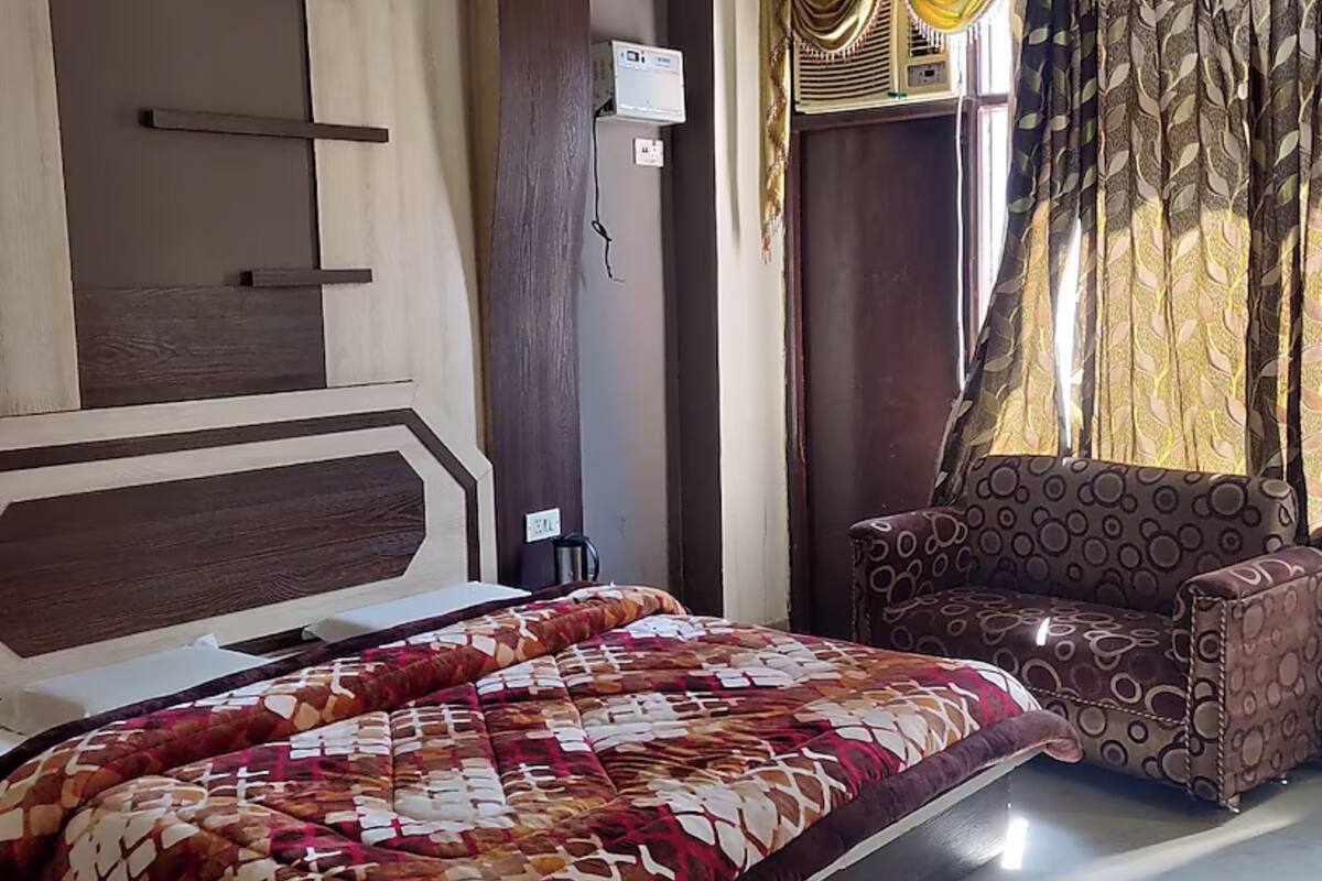 Premium bedding, down comforters, memory foam beds, in-room safe