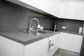 Fridge, microwave, dishwasher, coffee/tea maker