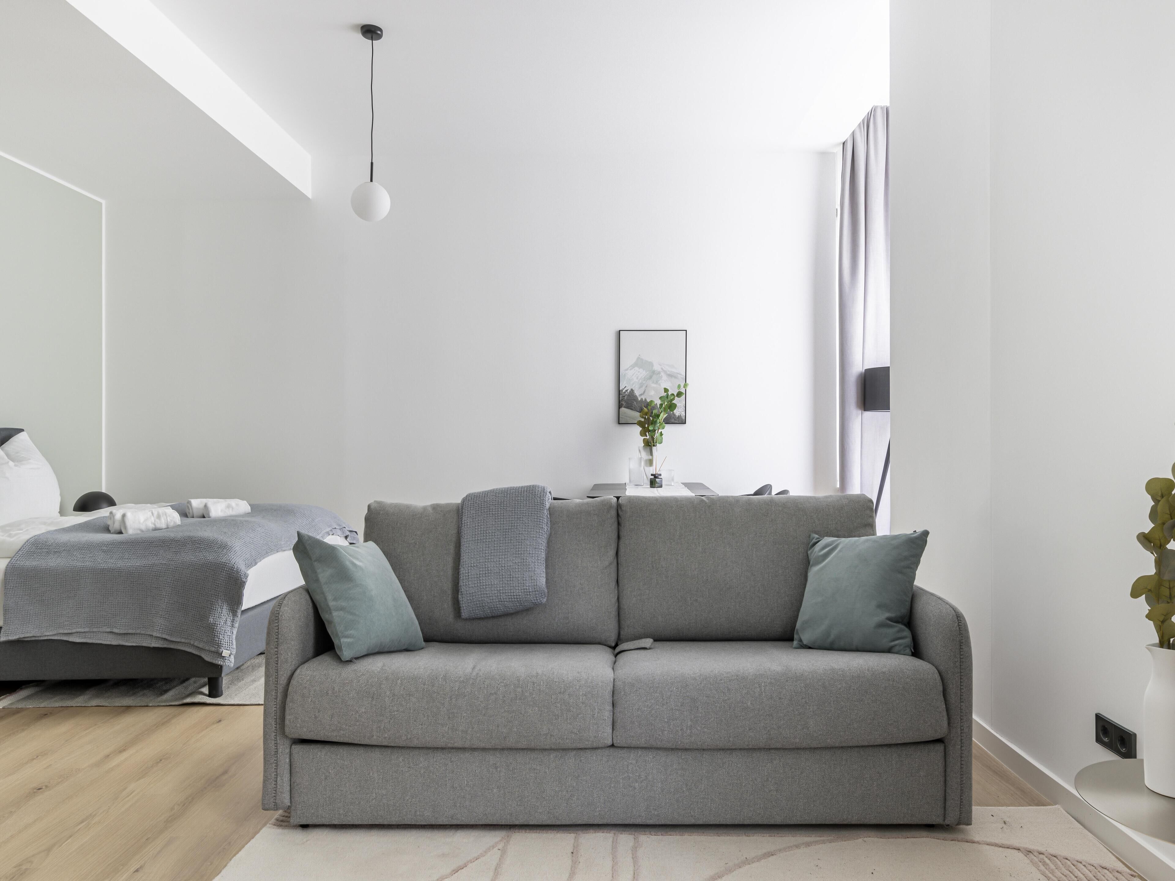 Suite XL with sofa bed | Area soggiorno | Smart TV 50 pollici con canali via cavo, TV