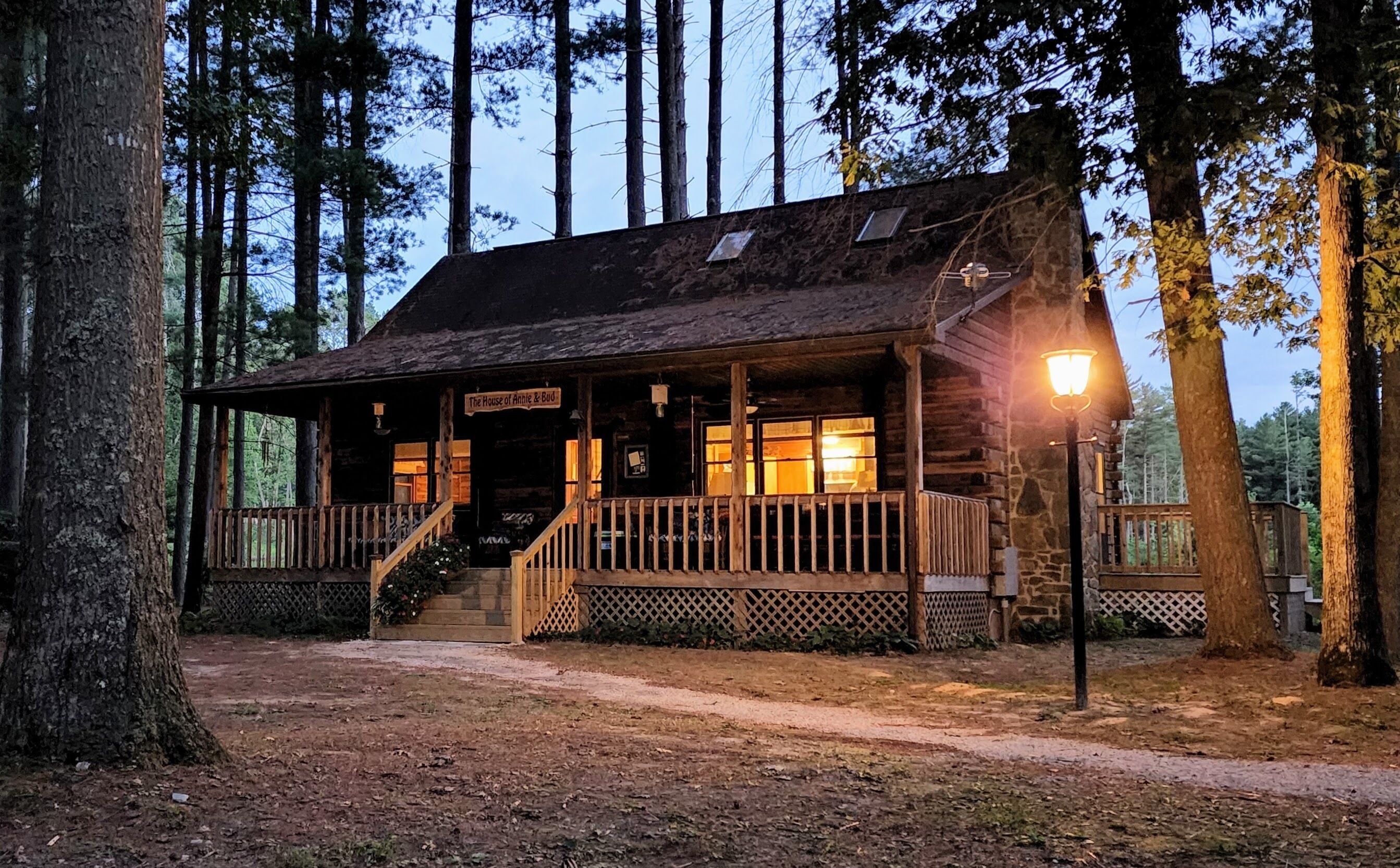 Cozy log cabin with modern amenities and a park view!