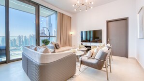 Luxury Apartment | Living area | 65-inch flat-screen TV with satellite channels, TV - 3205 Downtown Views (Dubai)