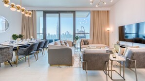Luxury Apartment | Living area | 65-inch flat-screen TV with satellite channels, TV - 3205 Downtown Views (Dubai)