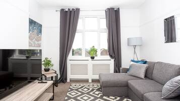 Deluxe Apartment, 4 Bedrooms, Non Smoking | Living area | 32-inch flat-screen TV with digital channels, TV