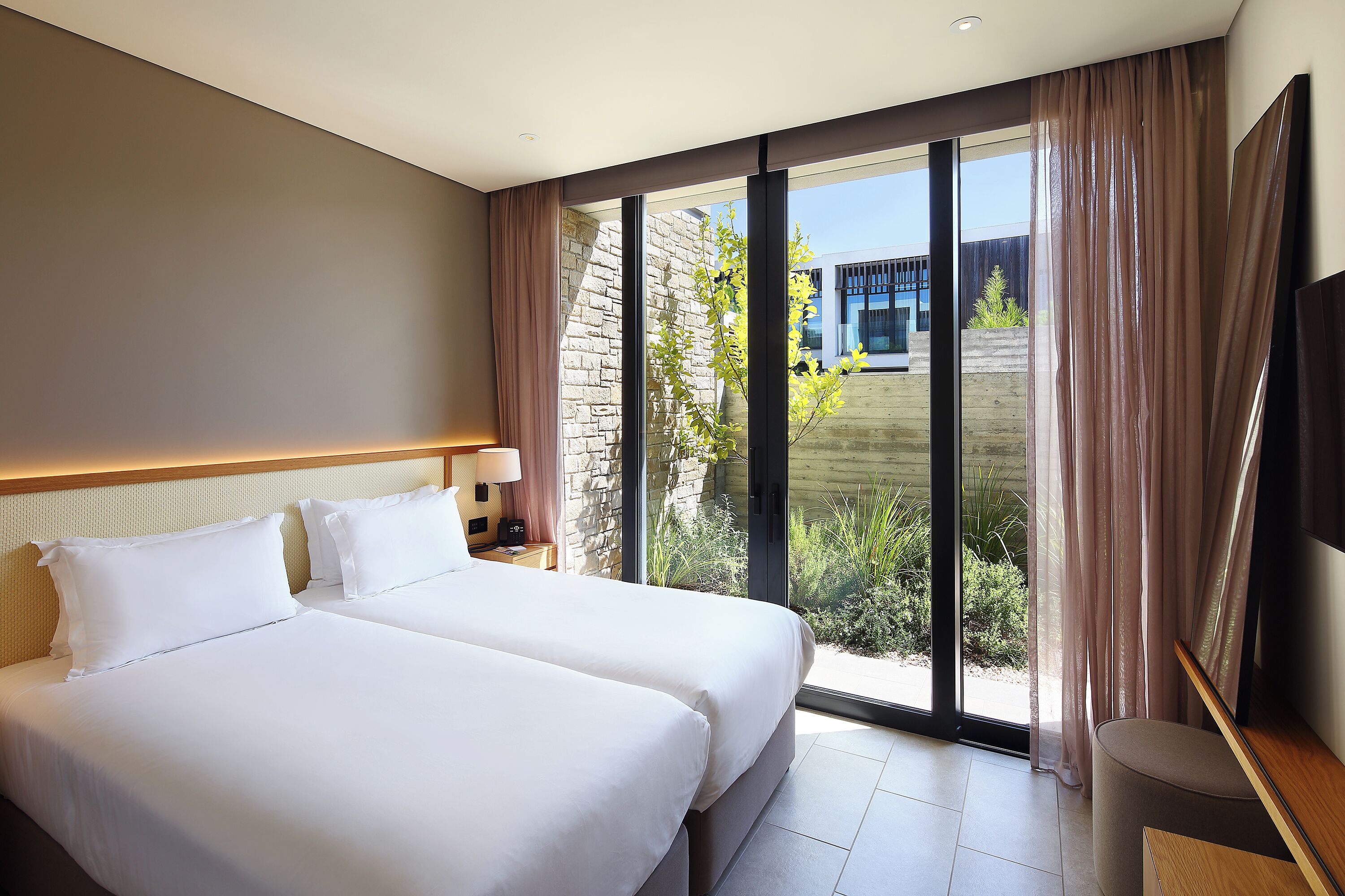 Hypo-allergenic bedding available, memory foam beds, in-room safe